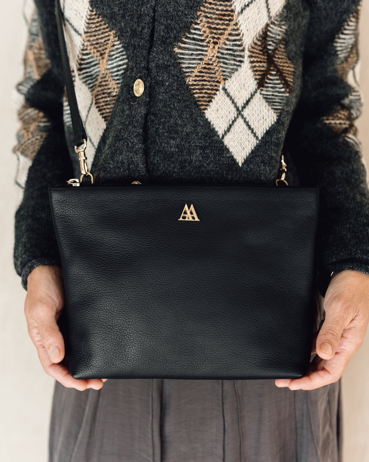 Pochette en cuir noire Manola
