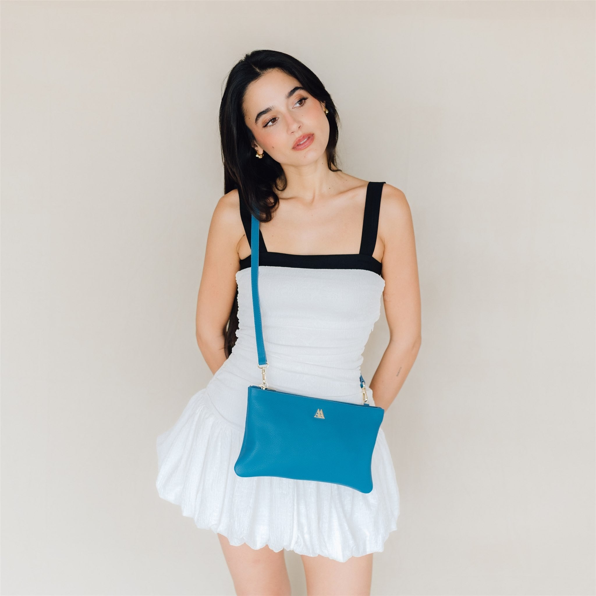 Pochette Catalina en cuir turquoise