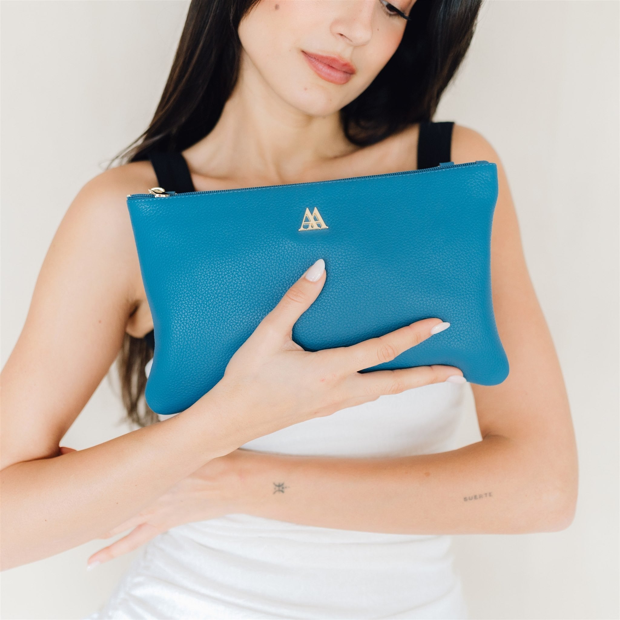 Pochette Catalina en cuir turquoise